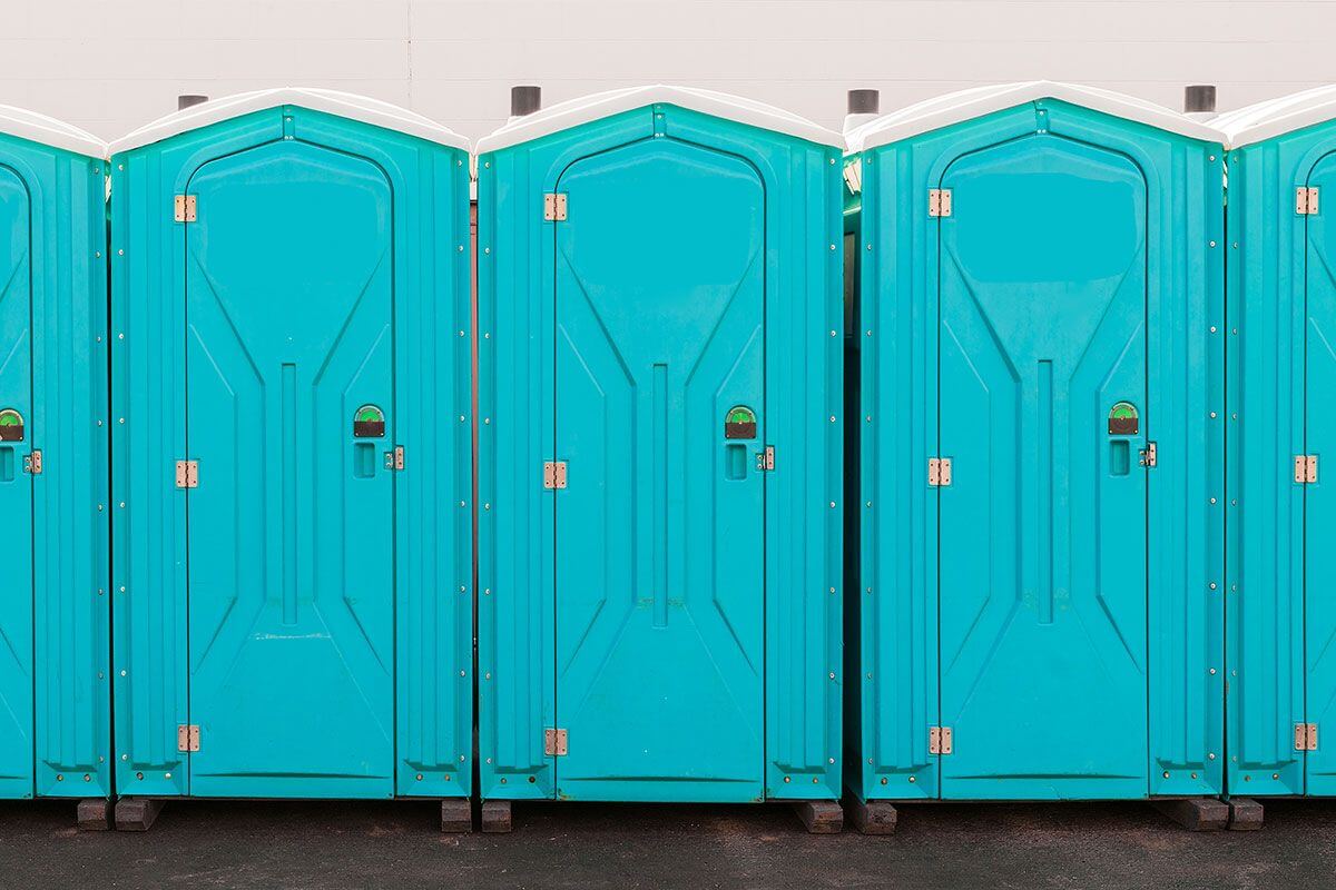 Industrial portable restroom units at a plant in Lake Elsinore, California
